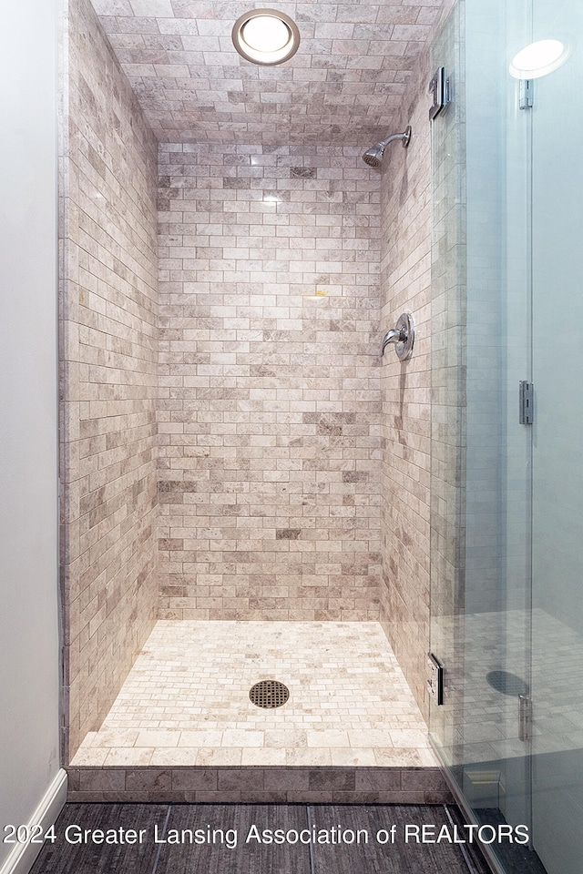 bathroom featuring an enclosed shower