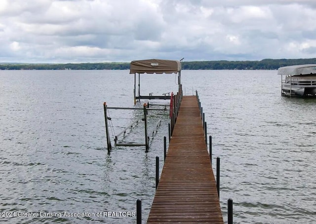 dock area with a water view