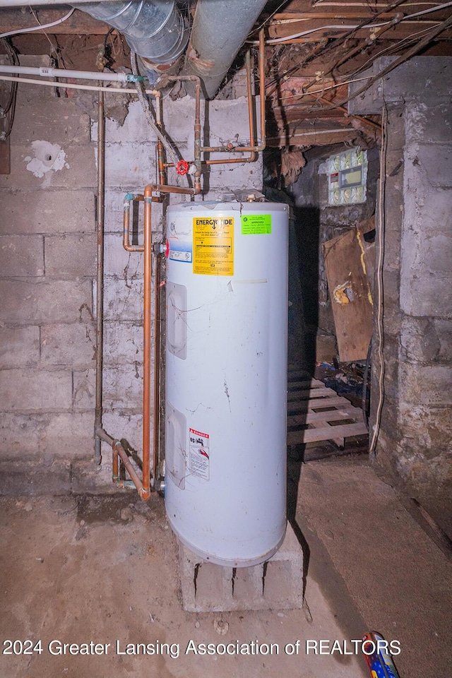 utility room with water heater