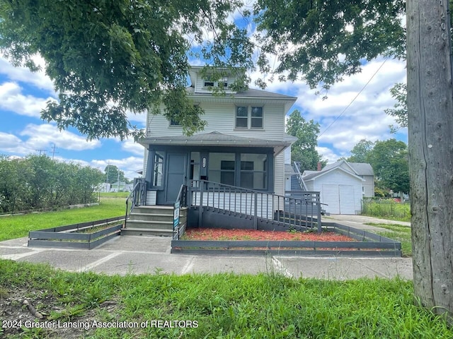 view of front of property featuring covered porch