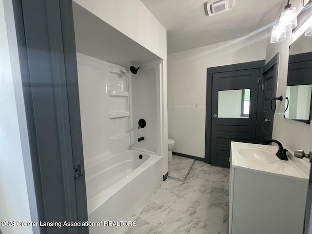 full bathroom featuring visible vents, toilet, marble finish floor, vanity, and washtub / shower combination