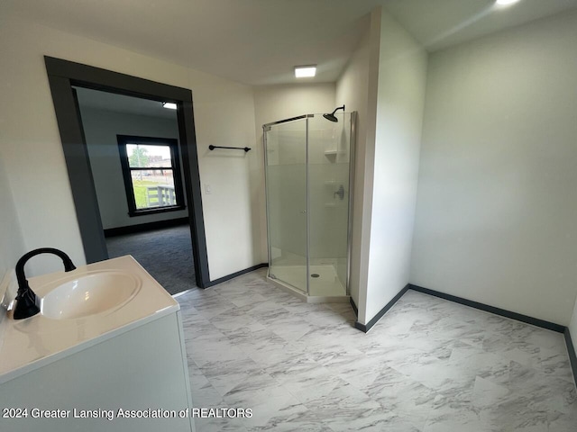 bathroom with vanity, tile patterned floors, and walk in shower