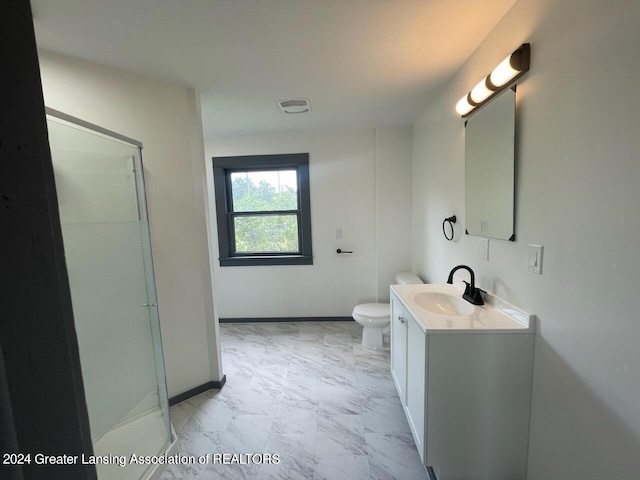 bathroom with tile patterned flooring, toilet, and vanity