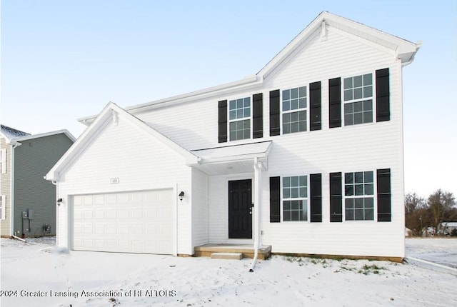 view of front of home featuring a garage