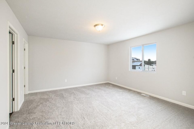 unfurnished bedroom featuring carpet flooring