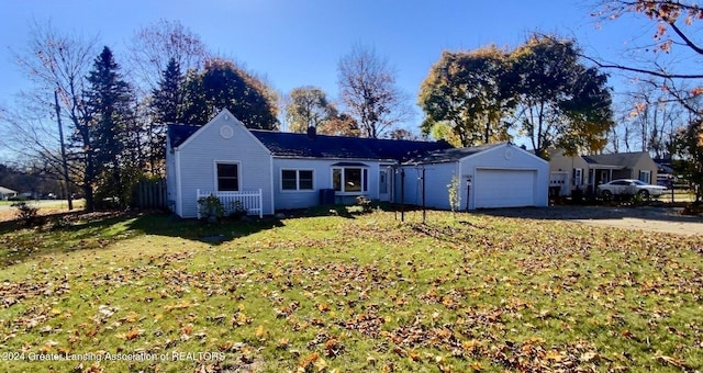 ranch-style home featuring a garage and a front lawn