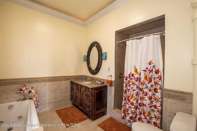 full bathroom with vanity, tile patterned flooring, tile walls, toilet, and ornamental molding