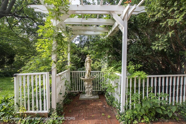 exterior space with a pergola