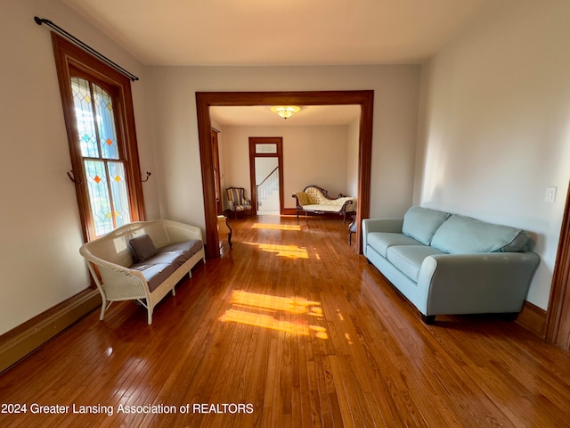 sitting room featuring wood-type flooring