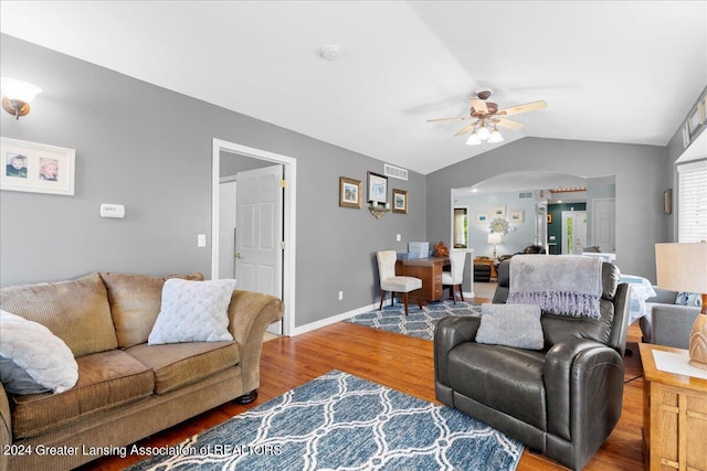 living room with vaulted ceiling, ceiling fan, and hardwood / wood-style floors