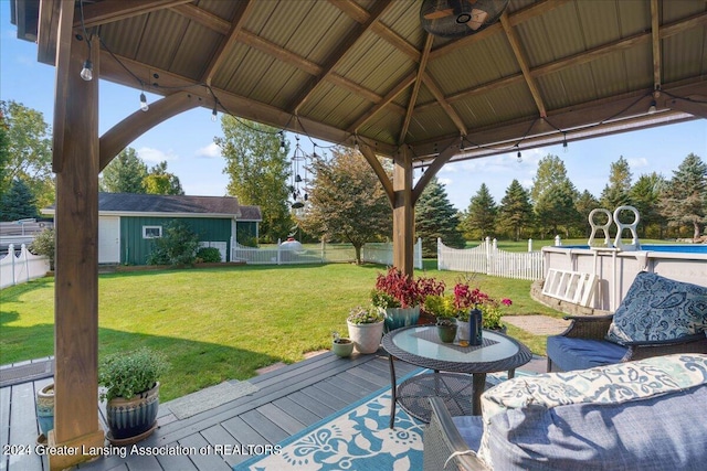 view of patio / terrace with a gazebo and a pool side deck