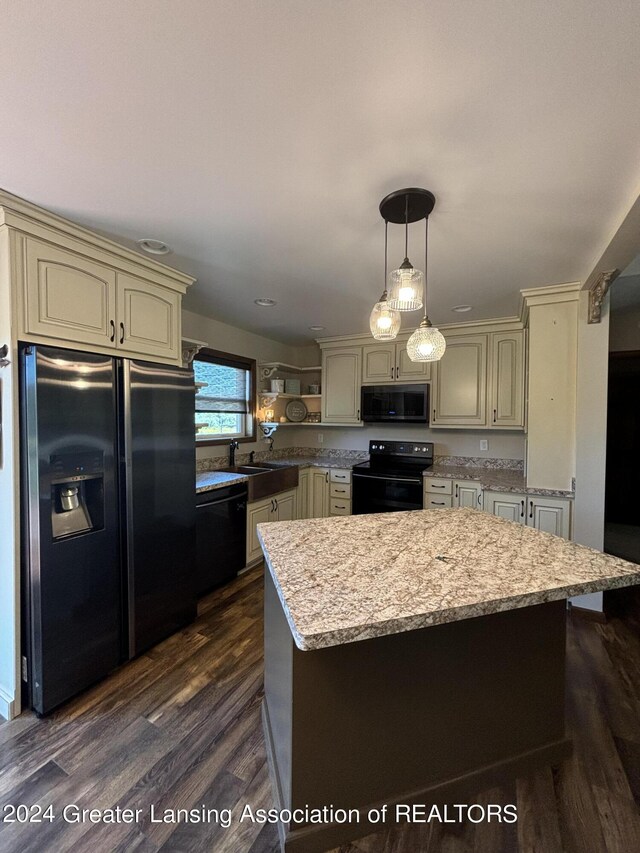 14850 22 1/2 Mile Rd, Marshall, MI 49068 - kitchen with black appliances, cream cabinets, open shelves, dark wood finished floors, and decorative light fixtures