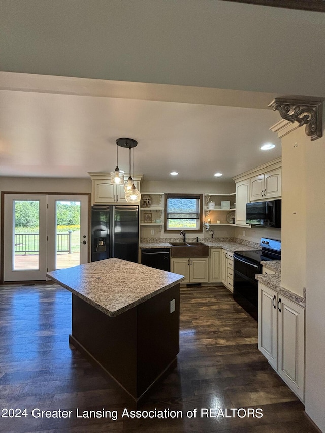 14850 22 1/2 Mile Rd, Marshall, MI 49068 - kitchen featuring black appliances, open shelves, plenty of natural light, dark wood finished floors, and recessed lighting