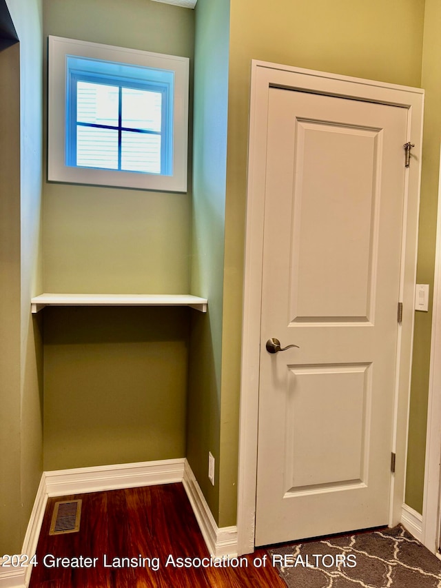 interior space with hardwood / wood-style flooring