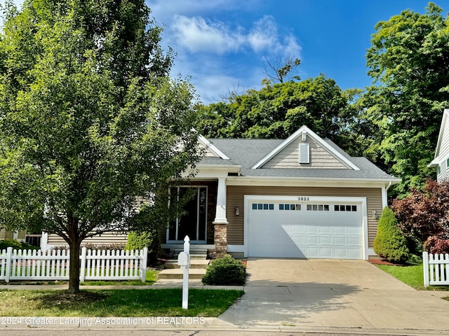 view of front of home with a garage