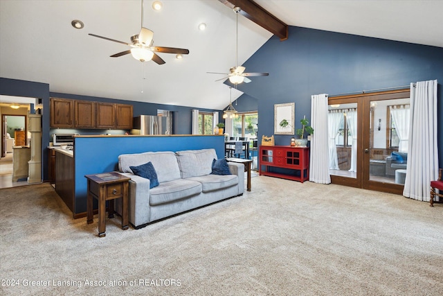 carpeted living room featuring ceiling fan, beamed ceiling, high vaulted ceiling, and french doors