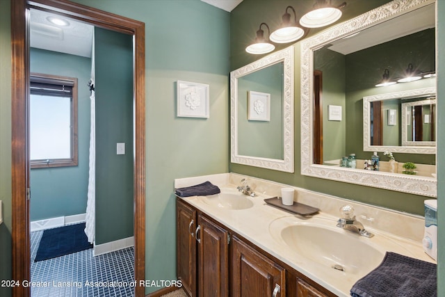 bathroom with vanity and tile patterned floors