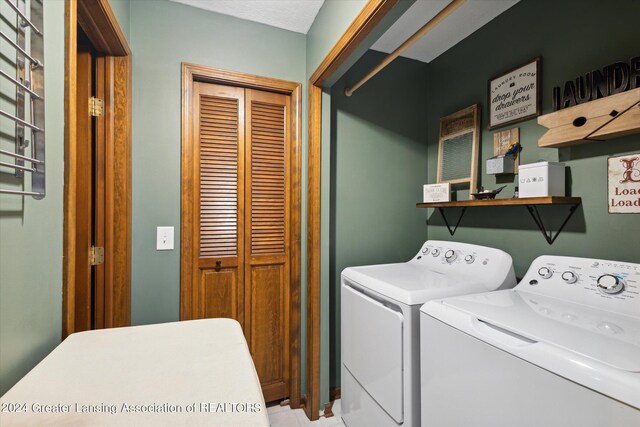 laundry area featuring washing machine and dryer