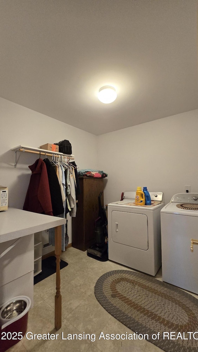 1205 N Chester Rd, Charlotte, MI 48813 - laundry area with washing machine and clothes dryer