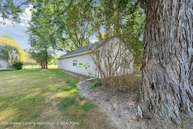 view of property exterior featuring a yard