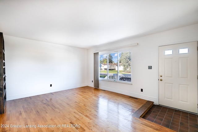 foyer entrance featuring hardwood / wood-style flooring