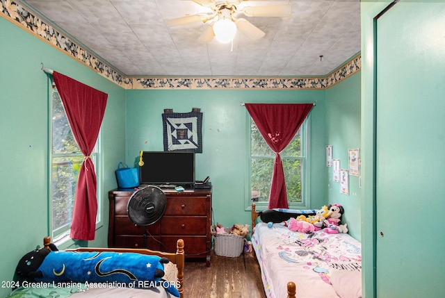 bedroom featuring wood finished floors