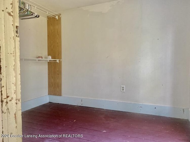 empty room featuring hardwood / wood-style flooring
