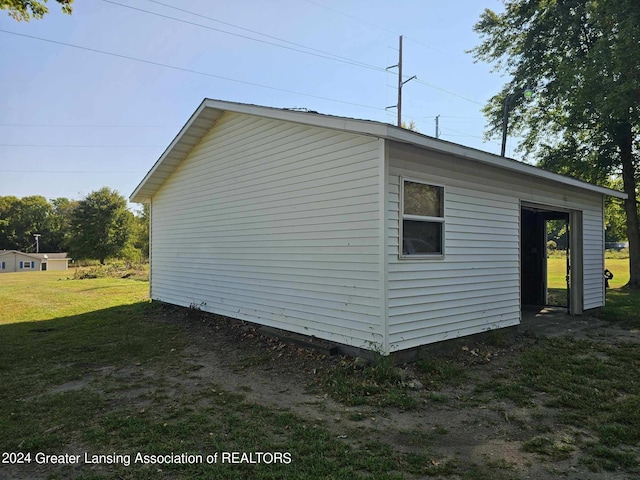 view of home's exterior with a lawn