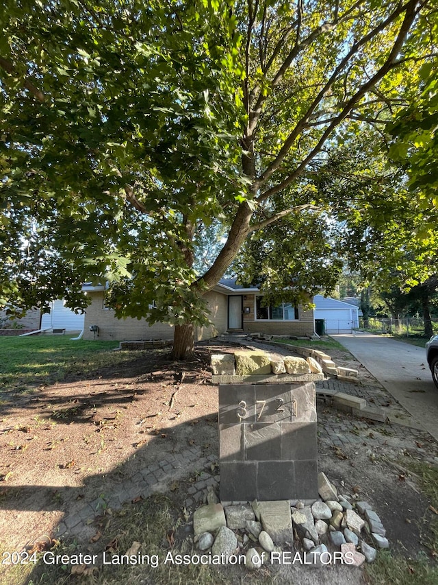 view of front of property with a garage