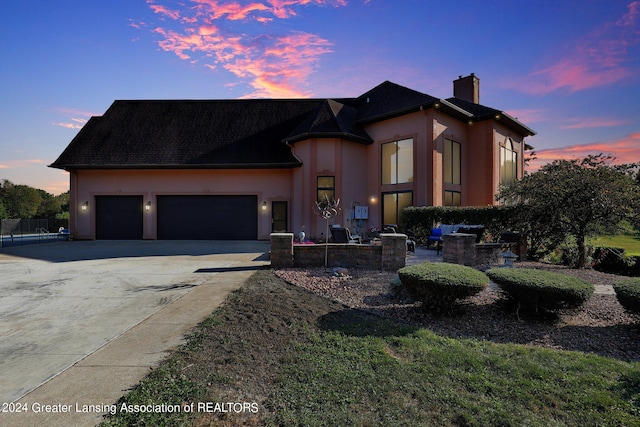 view of front of property with a garage