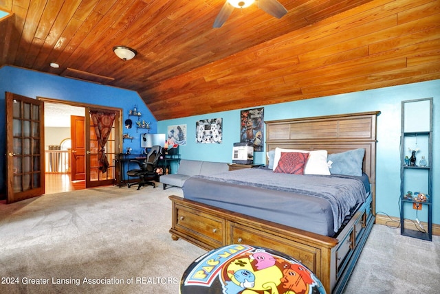 bedroom with wooden ceiling, vaulted ceiling, ceiling fan, and light colored carpet