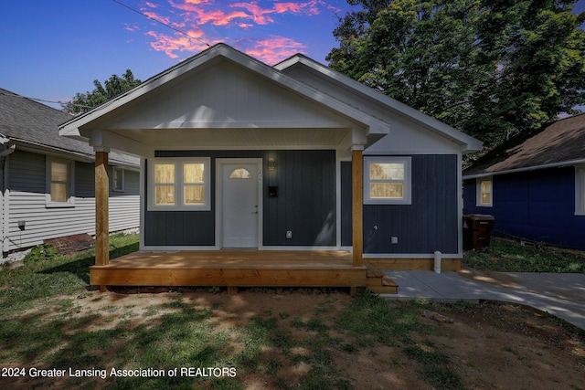 bungalow-style home featuring covered porch