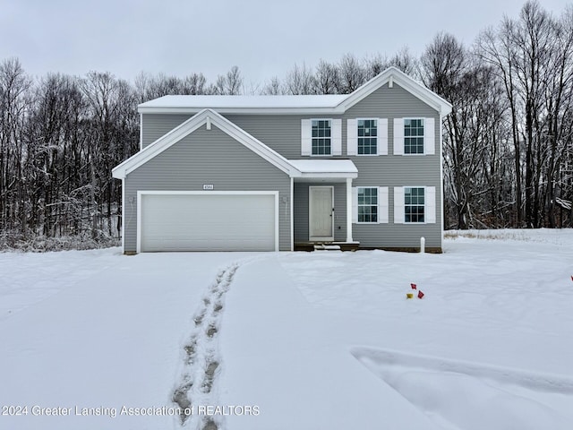 view of front of home featuring a garage