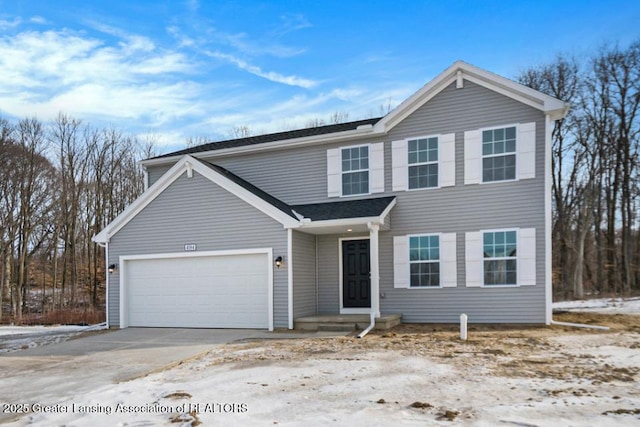 view of front of house with a garage