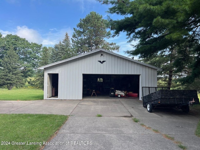 garage featuring a yard