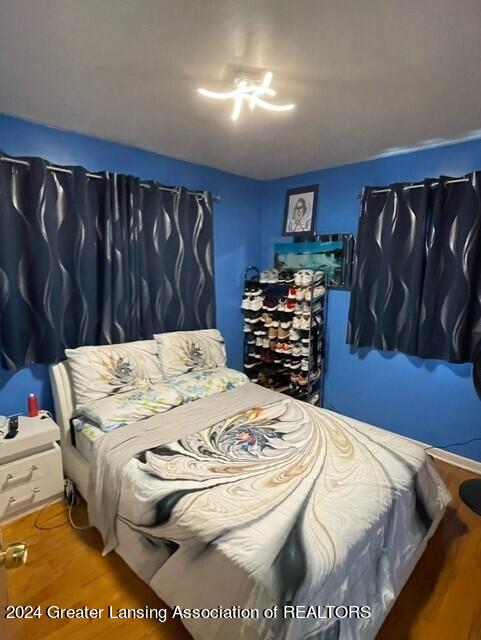 bedroom featuring hardwood / wood-style flooring