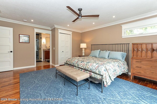 bedroom with ceiling fan, a closet, crown molding, and dark hardwood / wood-style flooring