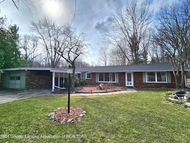 ranch-style house with a front yard and a carport