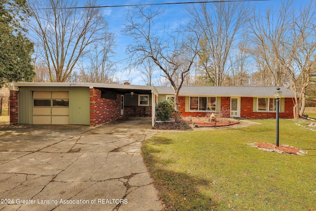 ranch-style house with a front yard, a carport, and a garage