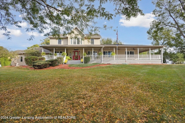 country-style home with a front lawn and a porch