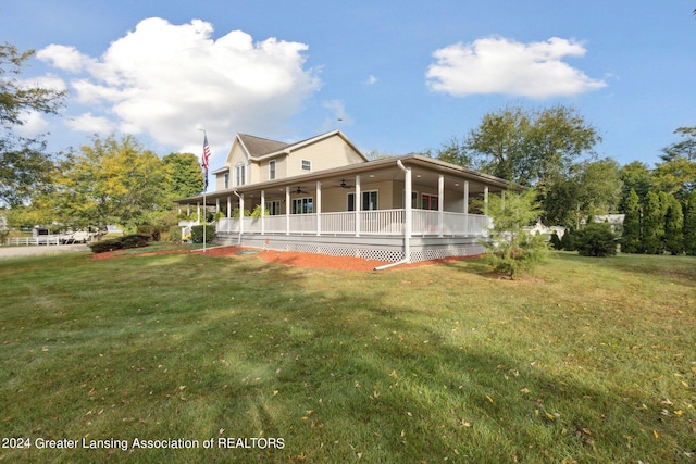 view of front of home with a porch and a front yard