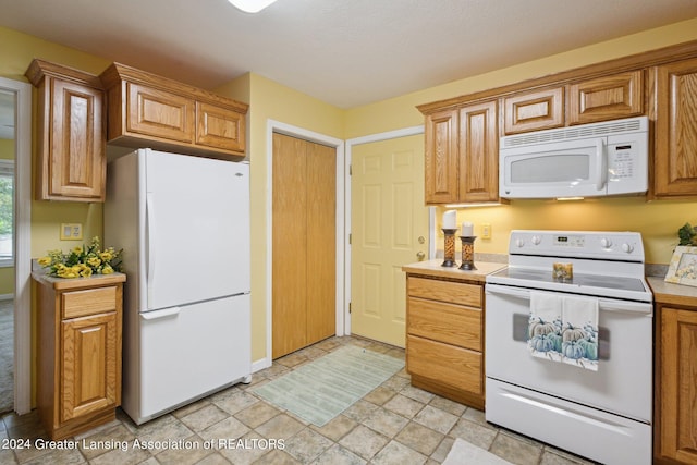 kitchen featuring white appliances