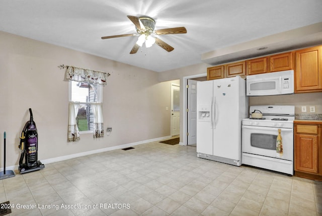 kitchen featuring ceiling fan and white appliances