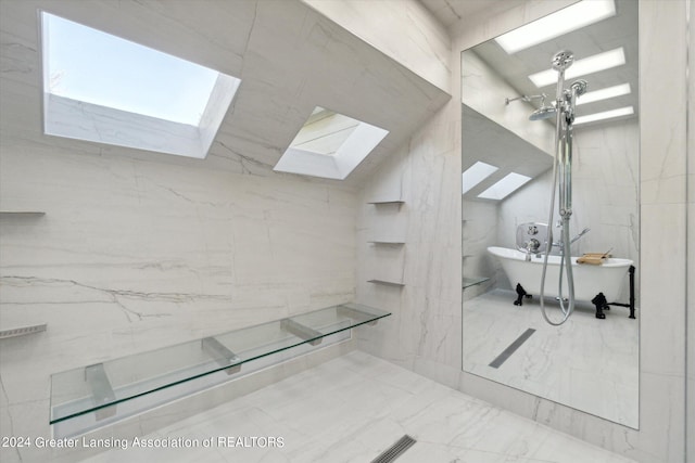 bathroom featuring shower with separate bathtub