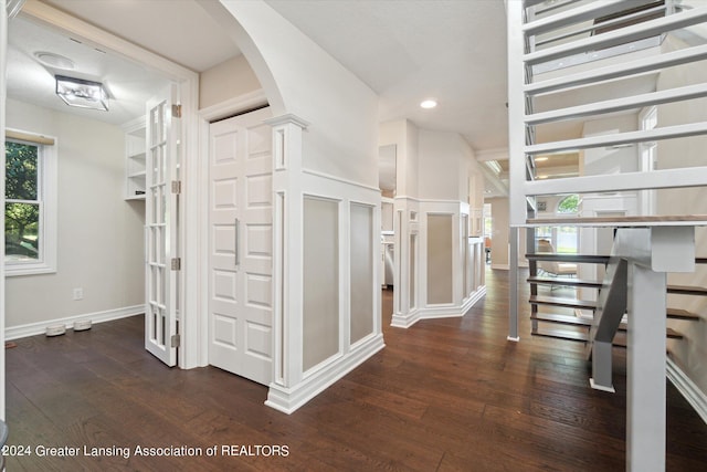 hallway featuring dark hardwood / wood-style floors