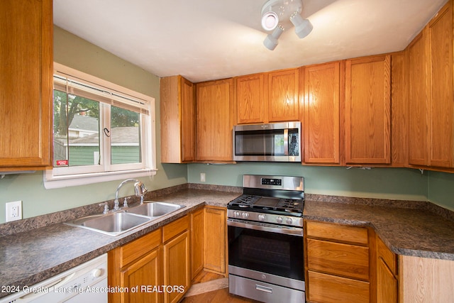 kitchen with sink and stainless steel appliances