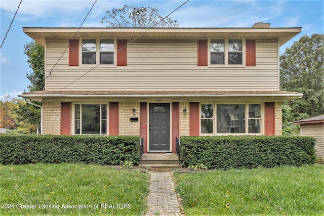 front of property with a front lawn