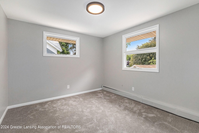 spare room with carpet flooring and a healthy amount of sunlight