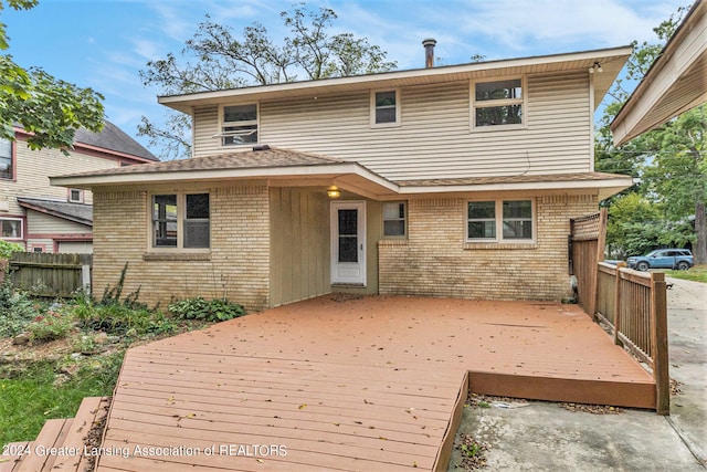 rear view of house with a deck