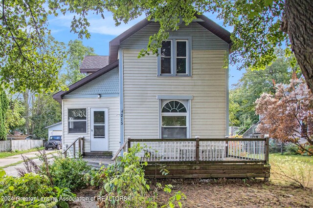 rear view of house with a deck